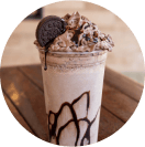 a milkshake in a tall glass